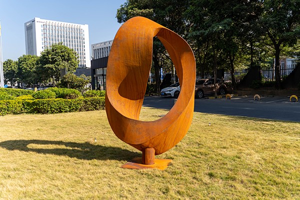 Large abstract corten steel sculpture for garden decoration